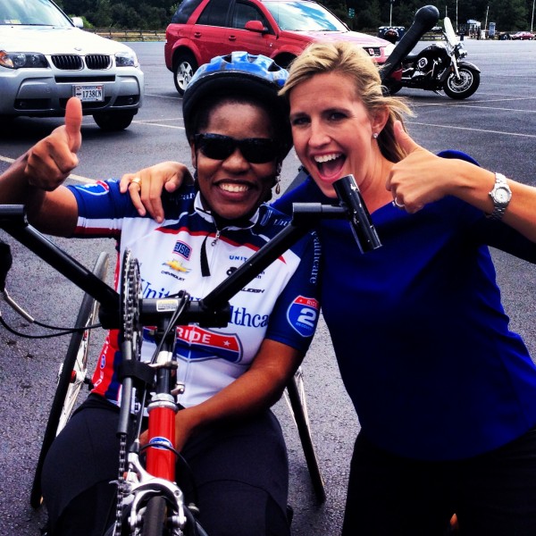 Mery Daniel, who was injured in the Boston bombing, celebrates riding 26 miles for "Ride 2 Recovery" on September 8, 2013 with CNN's Poppy Harlow.