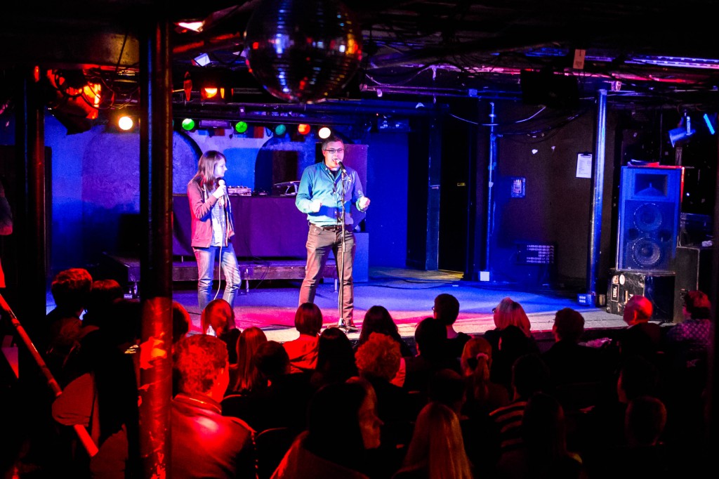 Erin Barker and Ben Lillie take the stage at Story Collider. Photo by Mark Zastrow.