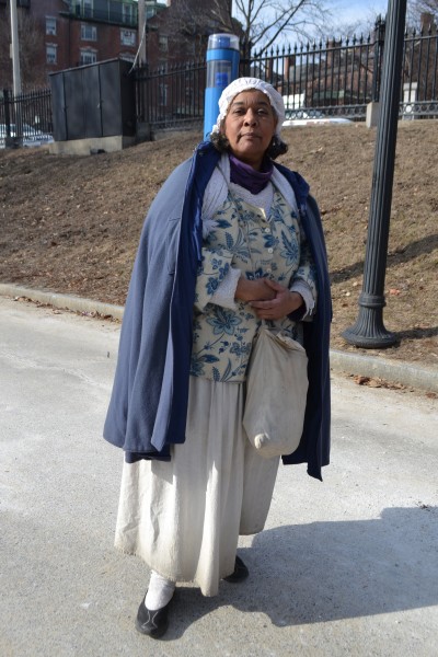 Guide dressed as Jean Gordon leads an African American Patriots Tour. (Megan Turchi/BUNS)