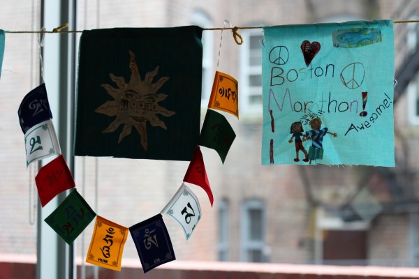 Flags that have already been made, hang in the Education Studio. (Chen Shen, BU News Service)