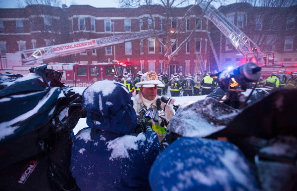 Allston, Mass, U.S. Feb. 2, 2015. District 1 Deputy Chief Mike Ruggere of the Boston Fire Department speaks to members of the media after responding to a 4-alarm fire at 79 Brighton Ave. on early Monday morning. (Photo by: Jun Tsuboike/BUNS)